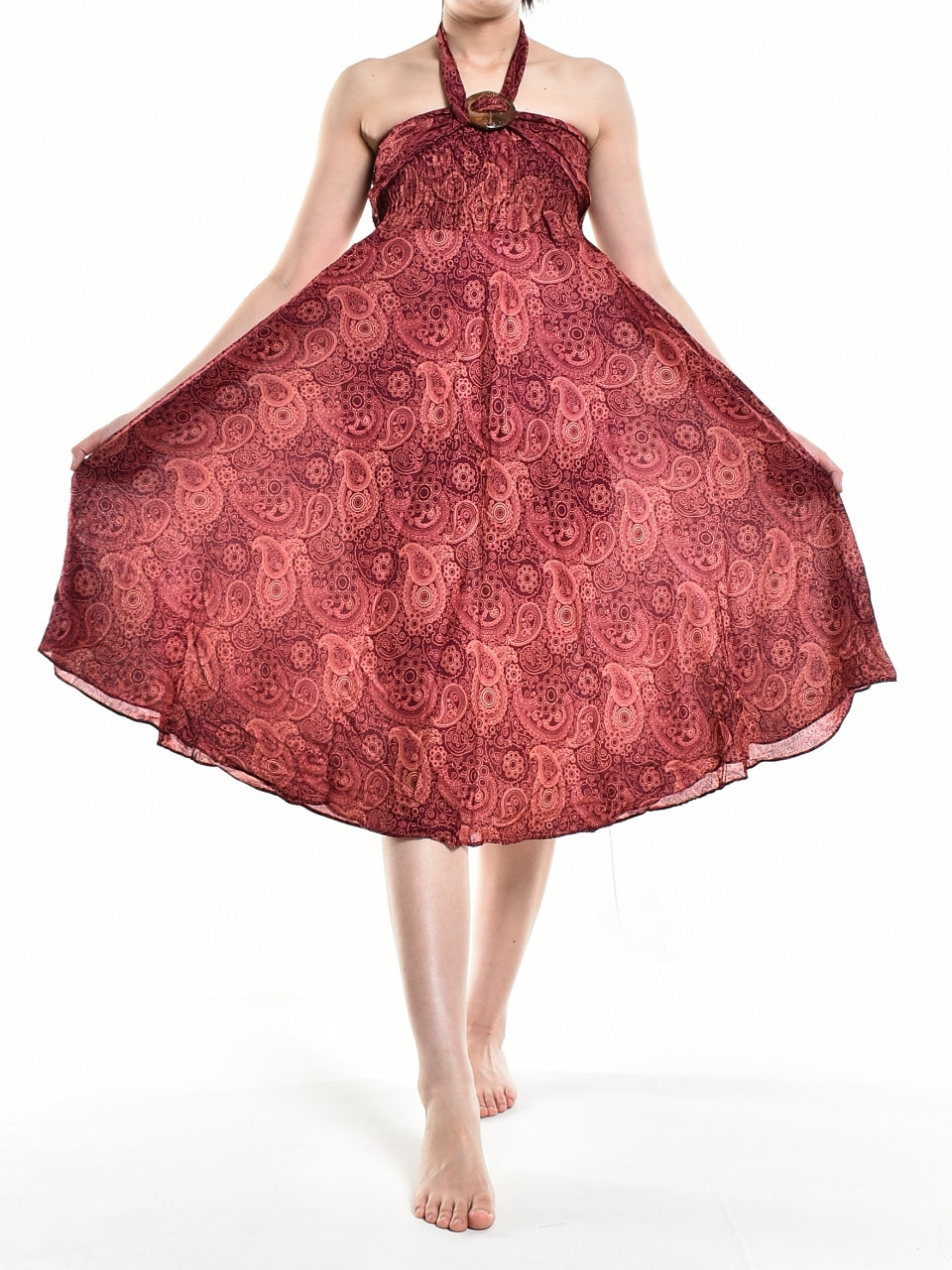 Bohotusk Red Orbit Long Skirt featuring a coconut buckle, showcasing its flowing design and elasticated smocked waist.